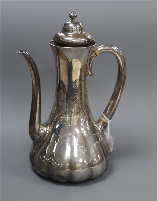 A late 19th century Tiffany & Co sterling hot water pot, engraved with ornate monogram, gross 14.5 oz.